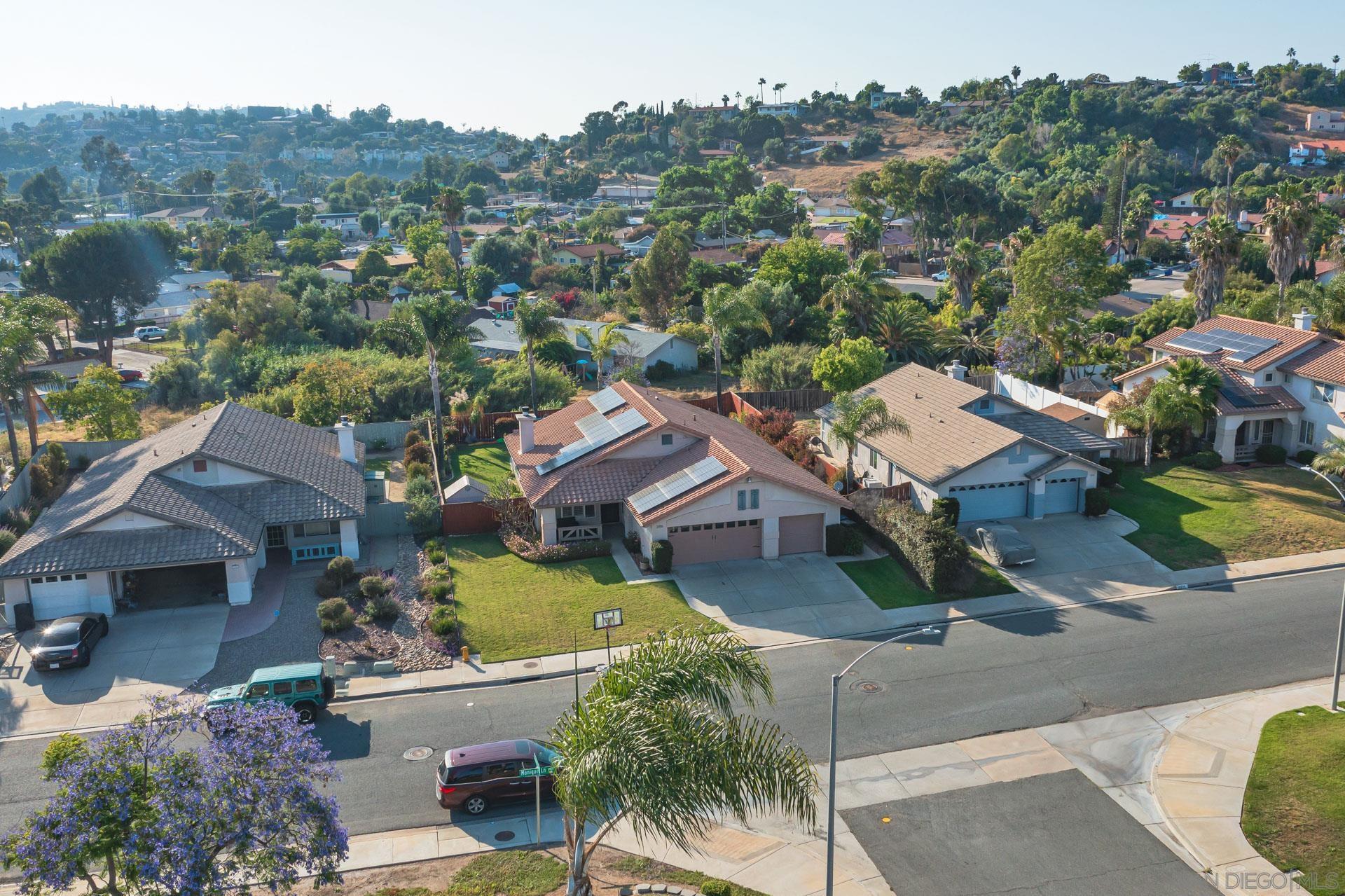 3396 Monique Lane Spring Valley, CA 91977 - Photo 8 of 31 an aerial view of a house with a garden