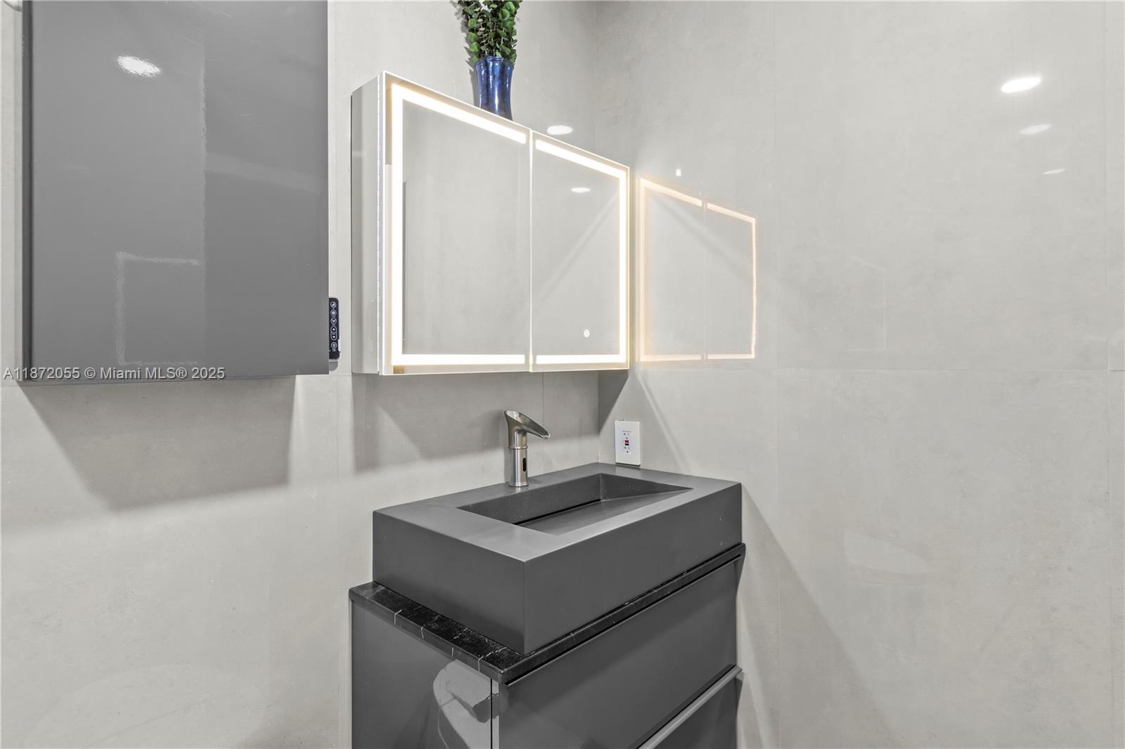 10615 Southwest 200th Street Cutler Bay, FL 33157 - Photo 12 of 35 a kitchen with a sink cabinets and a window