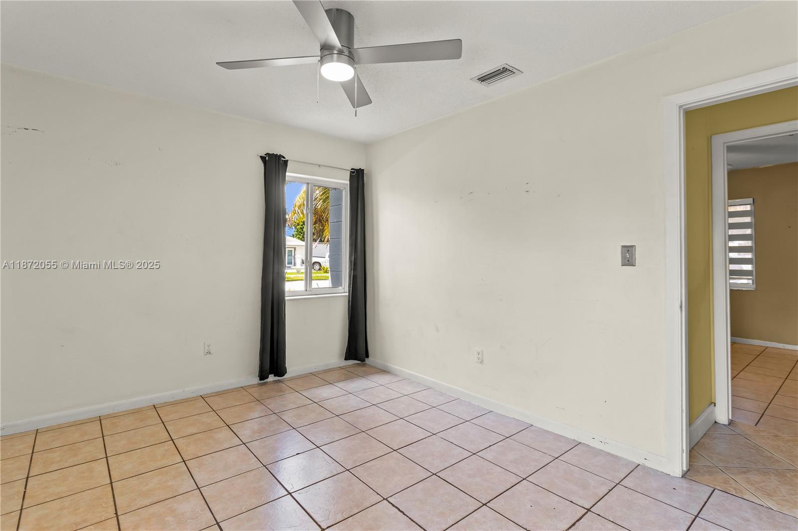 10615 Southwest 200th Street Cutler Bay, FL 33157 - Photo 18 of 35 a view of an empty room