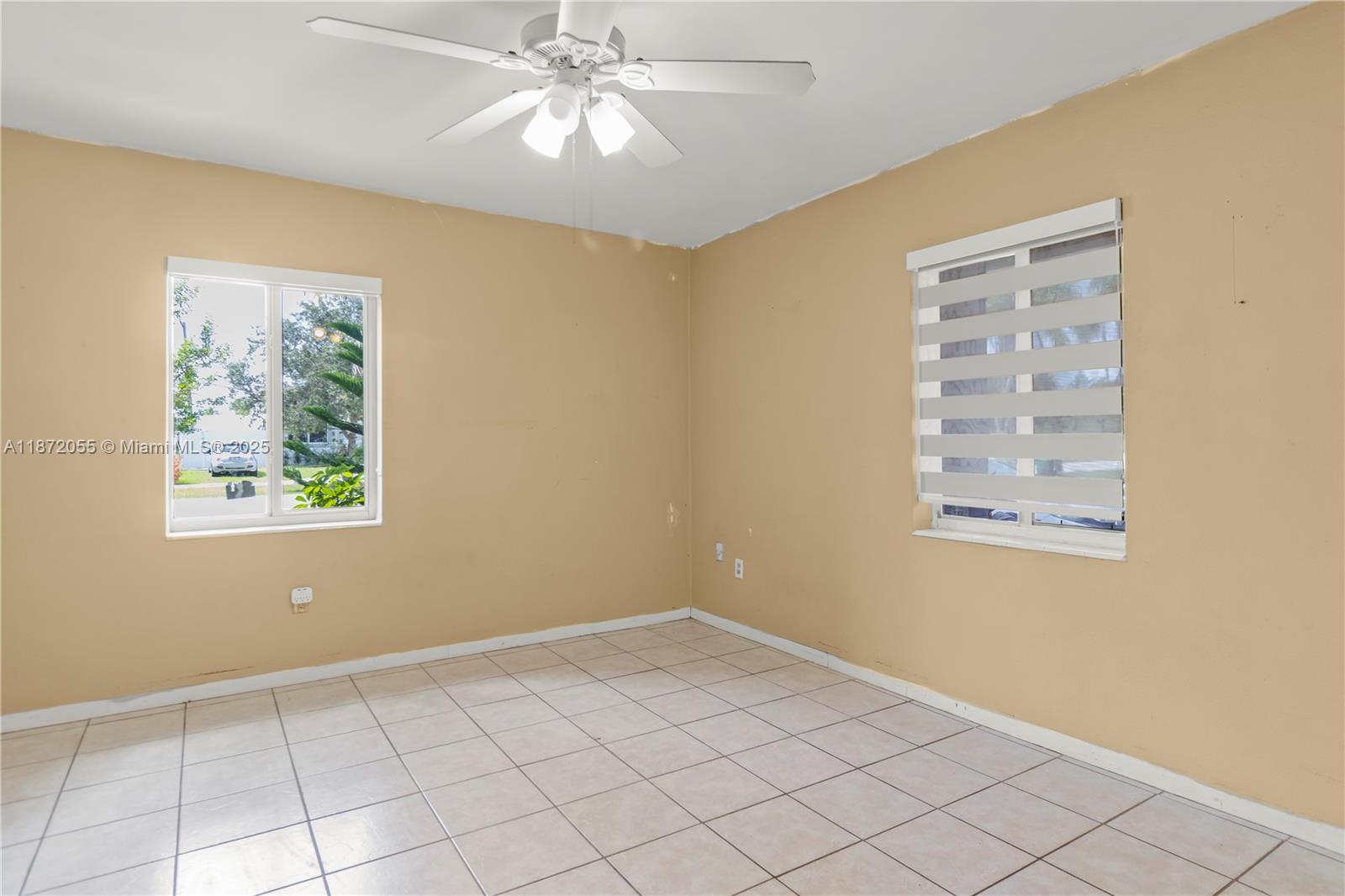 10615 Southwest 200th Street Cutler Bay, FL 33157 - Photo 19 of 35 a view of an empty room with a window