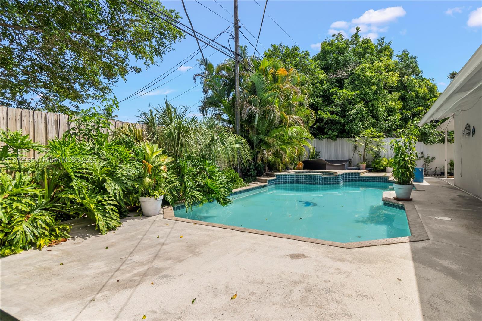10615 Southwest 200th Street Cutler Bay, FL 33157 - Photo 31 of 35 a view of a garden with a pathway