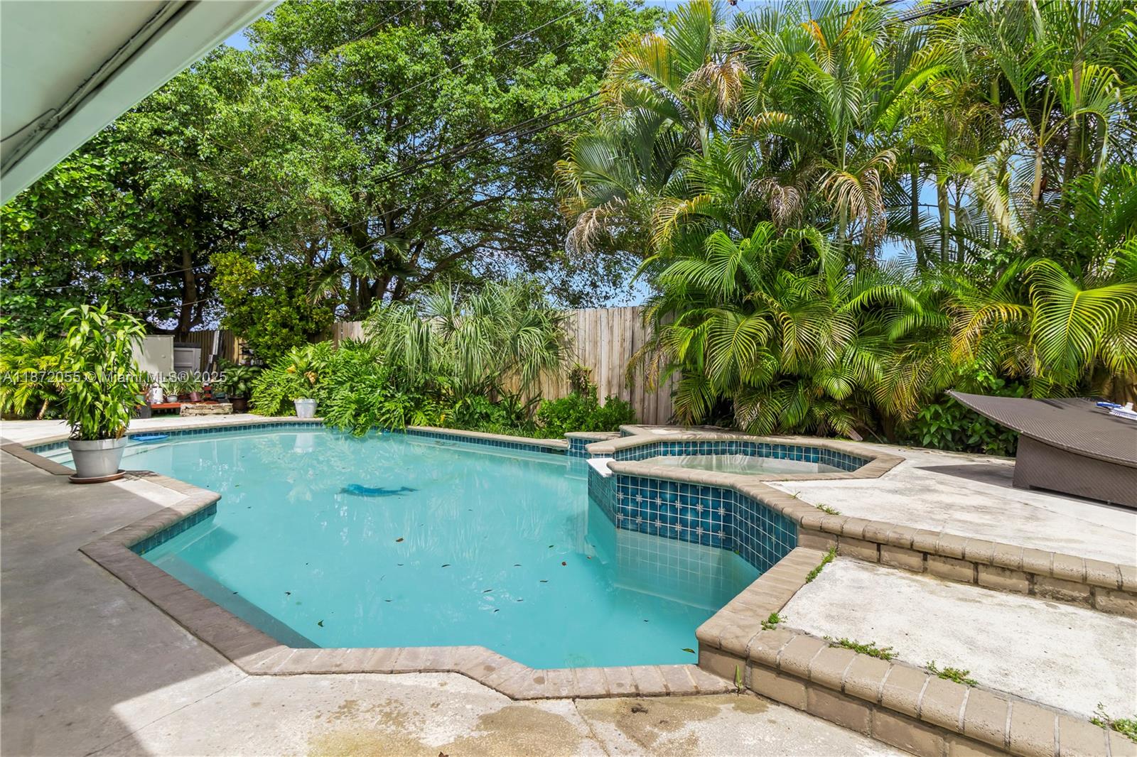 10615 Southwest 200th Street Cutler Bay, FL 33157 - Photo 33 of 35 a view of a backyard with swimming pool
