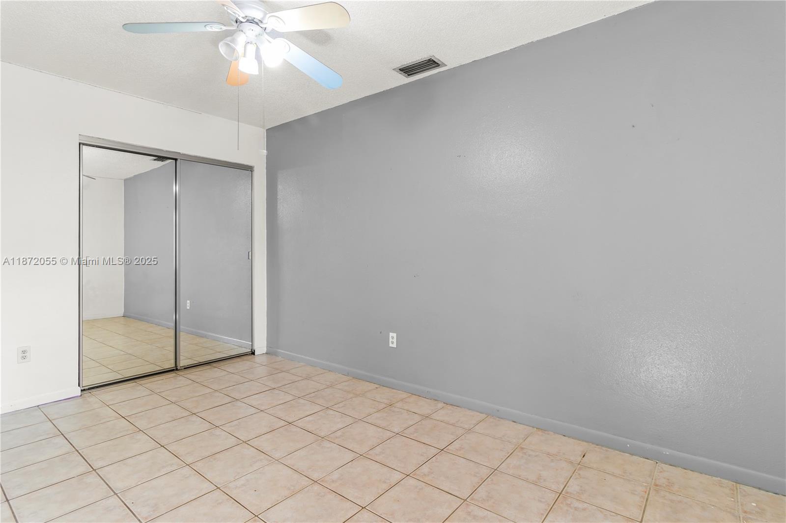 10615 Southwest 200th Street Cutler Bay, FL 33157 - Photo 9 of 35 a view of an empty room