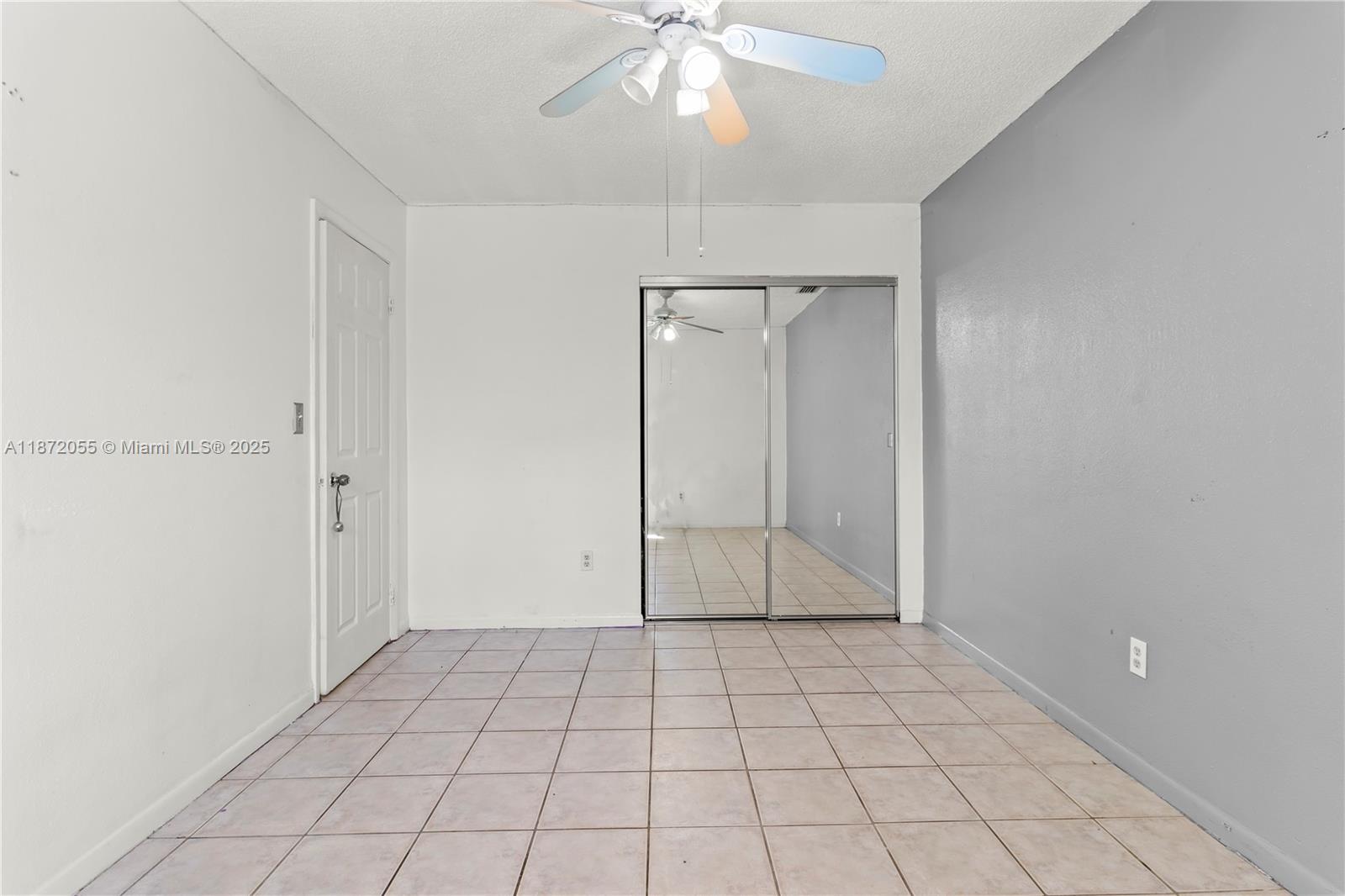 10615 Southwest 200th Street Cutler Bay, FL 33157 - Photo 10 of 35 a view of an empty room