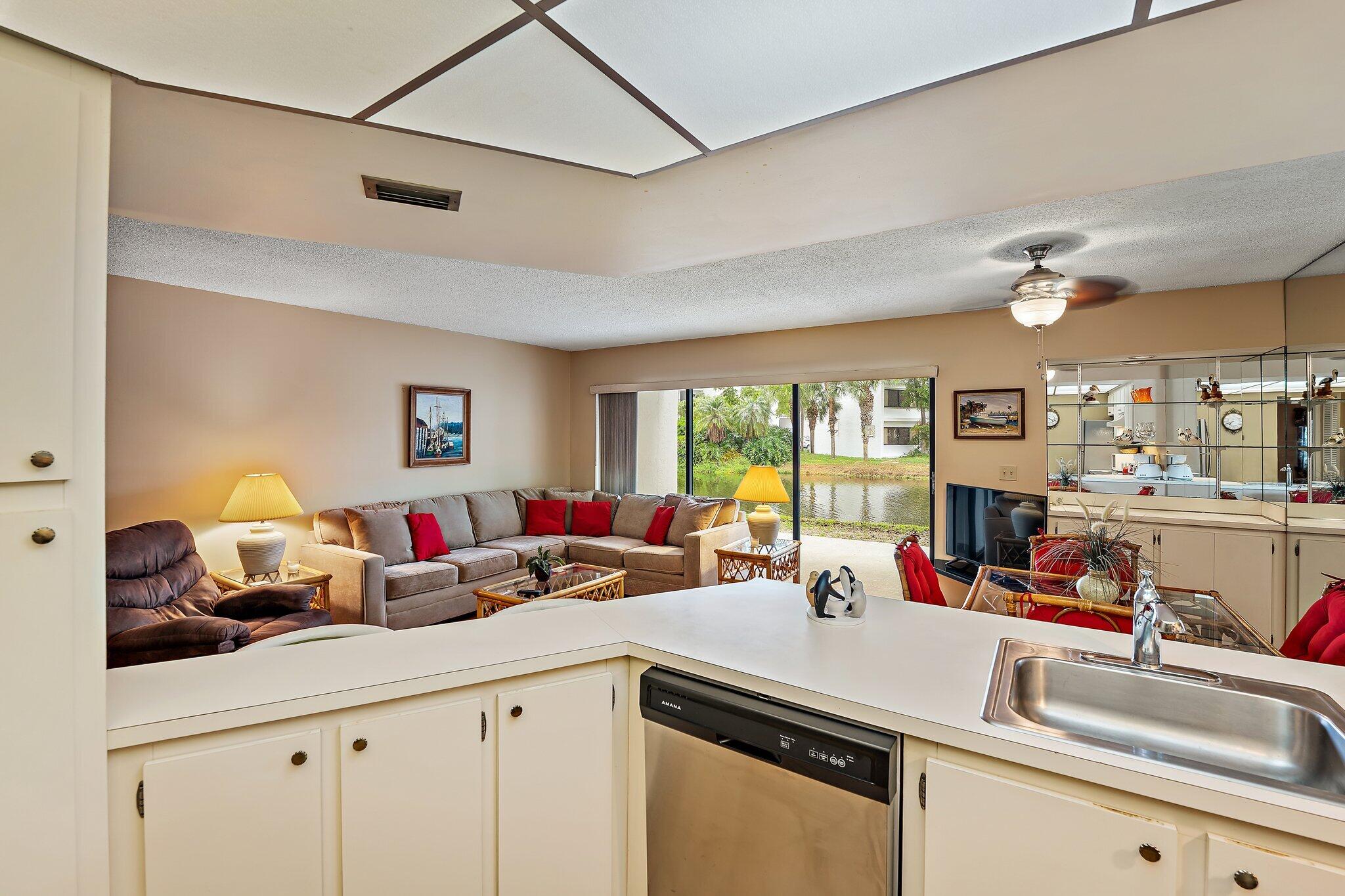 1605 Highway 1, Unit B104 Jupiter, FL 33477 - Photo 13 of 24 a kitchen with lots of counter top space