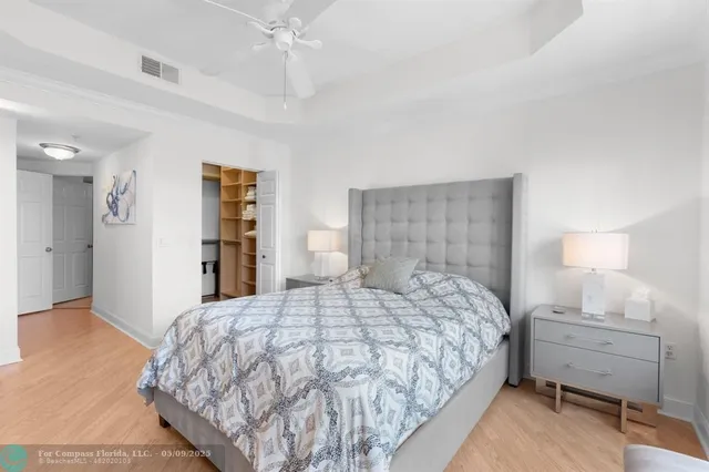 a bedroom with a bed and a closet