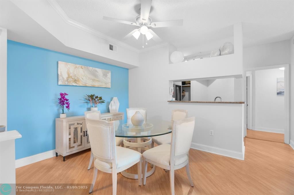 2417 Tuscany Way, Unit 2417 Boynton Beach, FL 33435 - Photo 4 of 27 a dining room with furniture and window