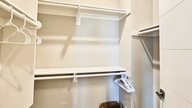 a en suite bathroom with a sink and mirror