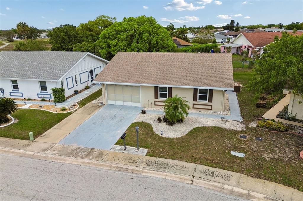 209 Genet Court Sun City Center, FL 33573 - Photo 30 of 31 front view of house with a yard