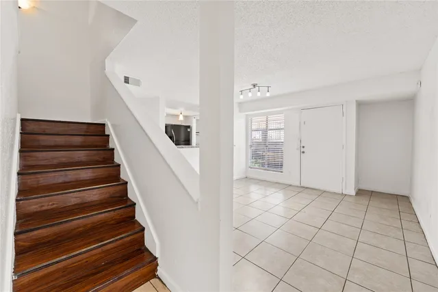 a view of an entryway with staircase