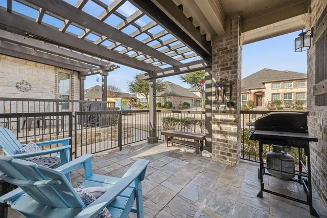 a reading room with furniture and a window