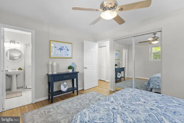 a bedroom with a bed and a fireplace