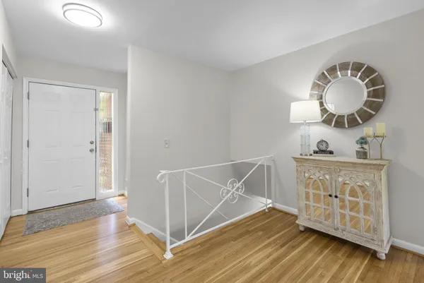 a view of a livingroom with wooden floor