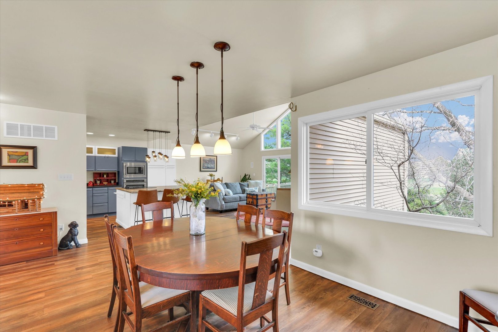29 Fields East Champaign, IL 61822 - Photo 11 of 46 a view of a dining room with furniture window and wooden floor