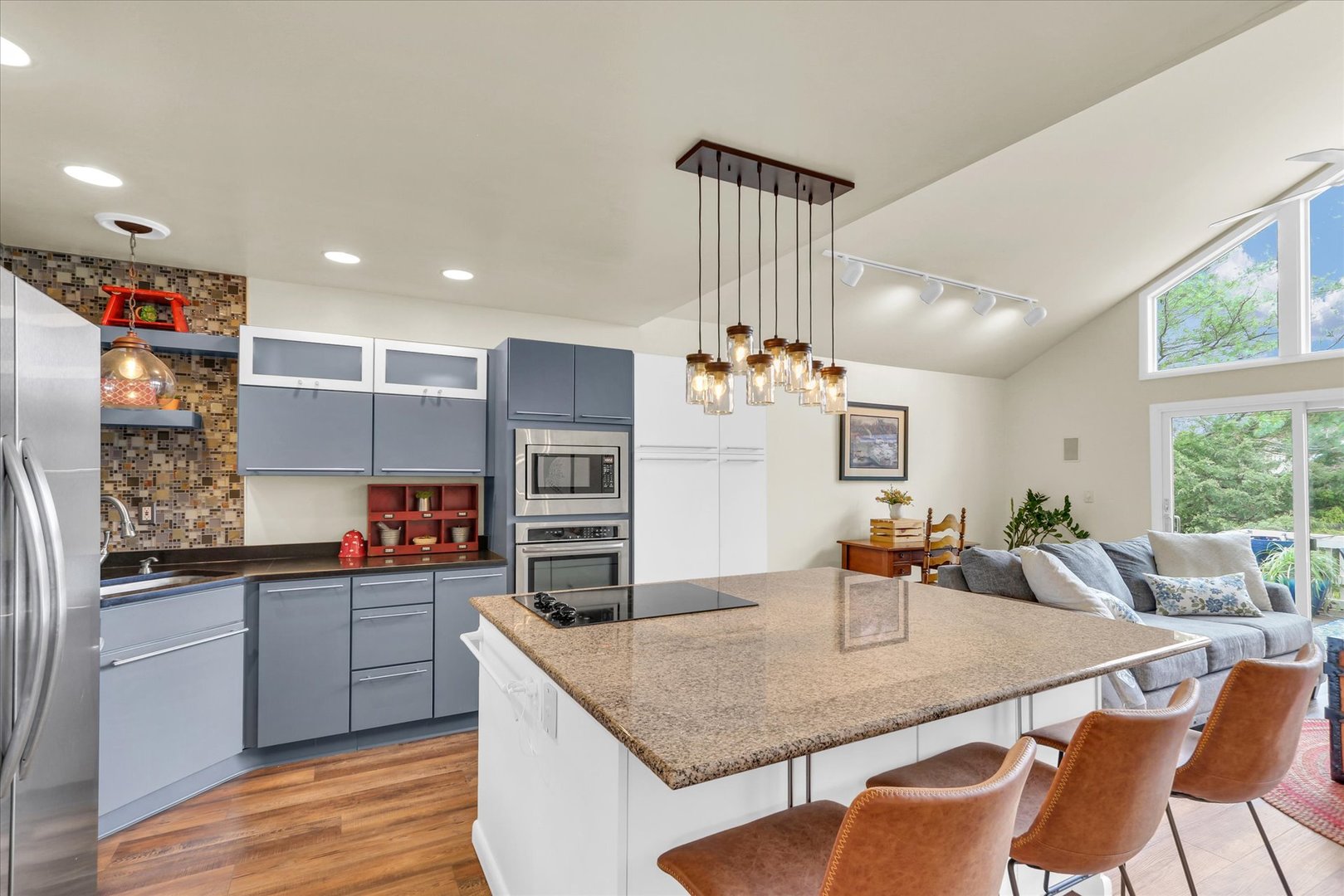 29 Fields East Champaign, IL 61822 - Photo 13 of 46 a kitchen with stainless steel appliances granite countertop a sink and counter space
