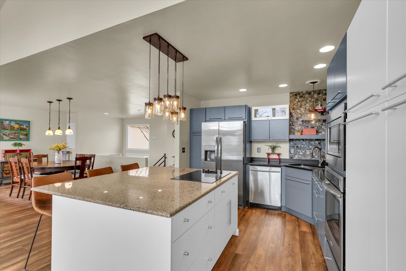 29 Fields East Champaign, IL 61822 - Photo 15 of 46 a kitchen with stainless steel appliances granite countertop a sink refrigerator and cabinets
