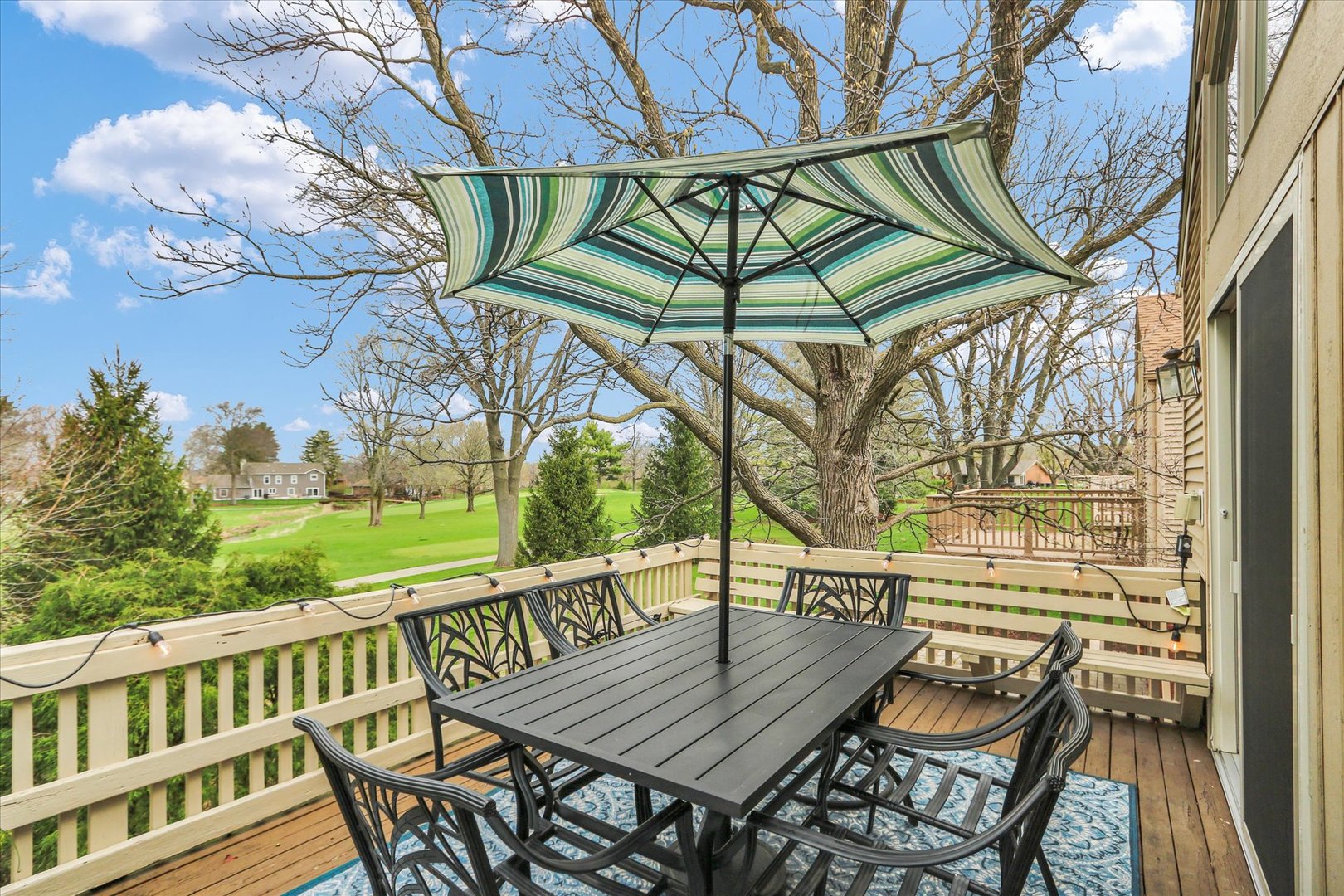 29 Fields East Champaign, IL 61822 - Photo 20 of 46 a view of a wooden chairs on the deck