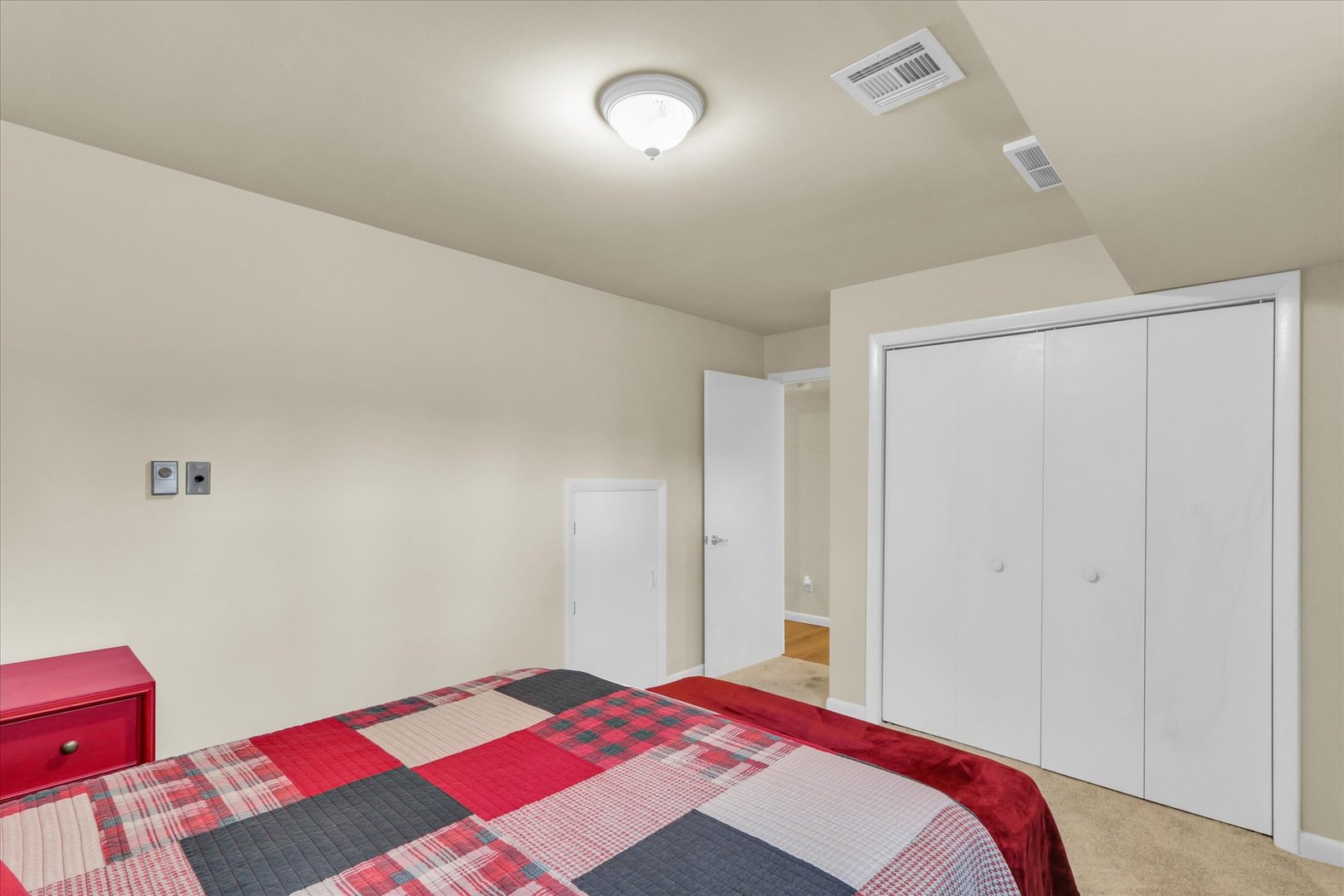 29 Fields East Champaign, IL 61822 - Photo 33 of 46 a bedroom with a bed and a wooden floor