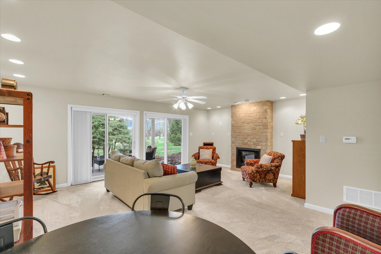 29 Fields East Champaign, IL 61822 - Photo 35 of 46 a living room with furniture and a large window