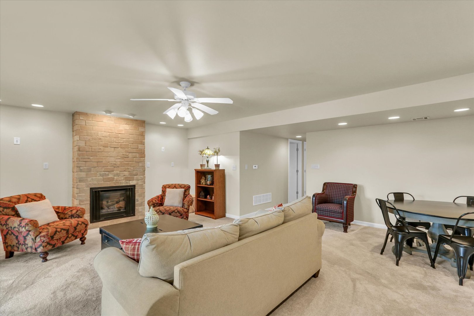 29 Fields East Champaign, IL 61822 - Photo 36 of 46 a living room with furniture and a fireplace