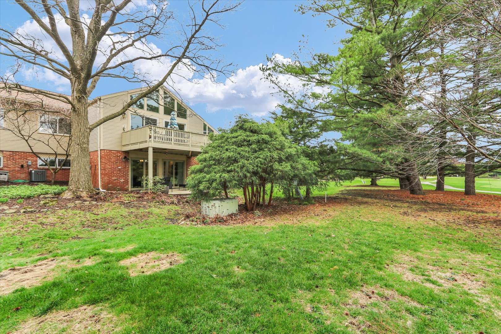 29 Fields East Champaign, IL 61822 - Photo 42 of 46 a front view of a house with a yard and trees