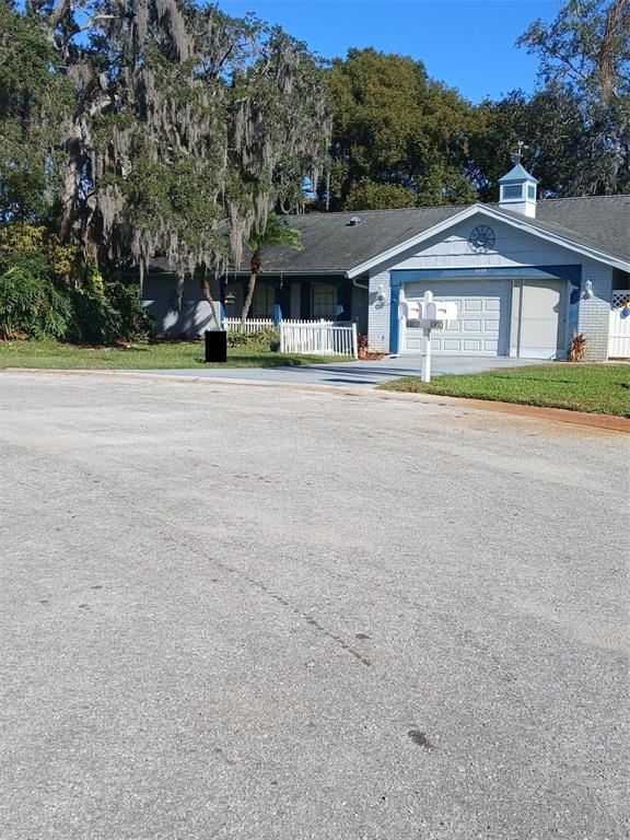 front view of house with a yard