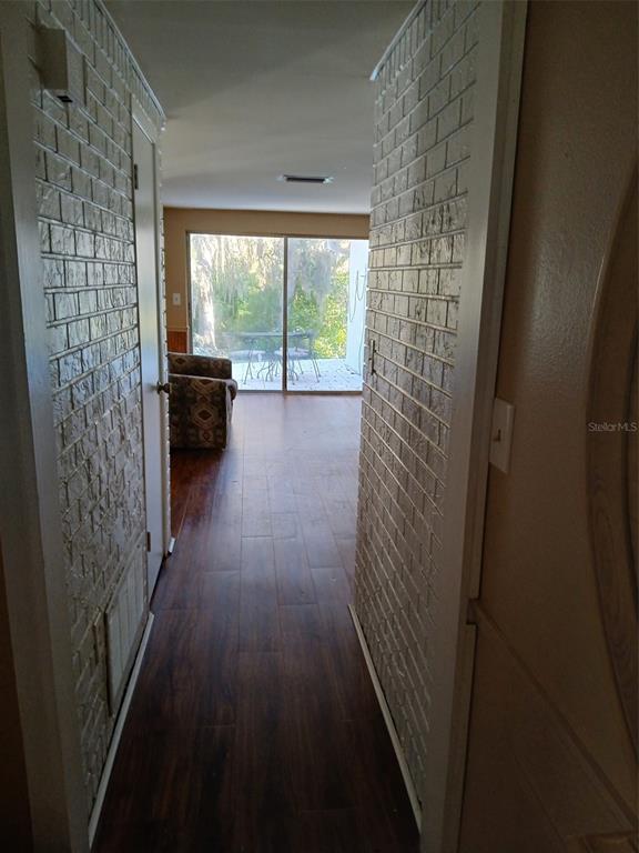 8809 Avondale Lane Hudson, FL 34667 - Photo 2 of 20 a view of a hallway