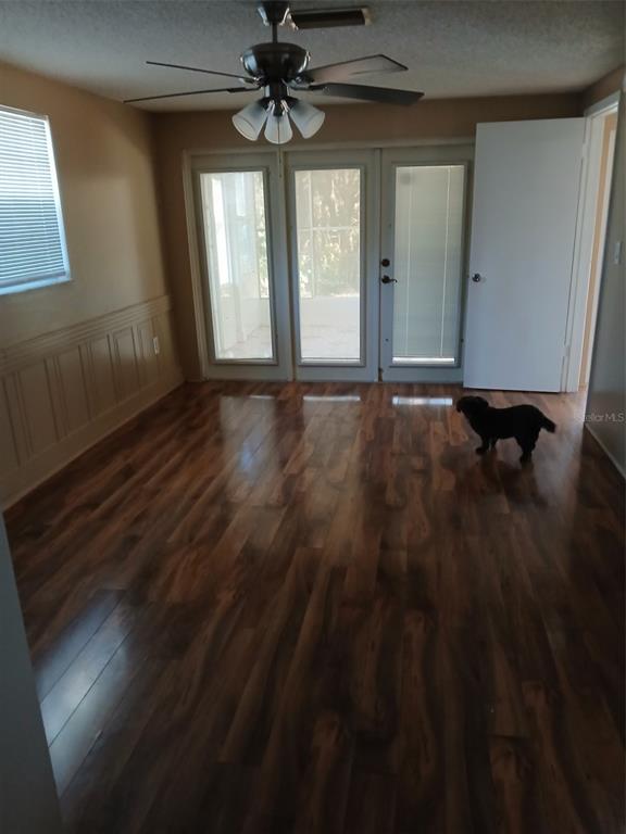 8809 Avondale Lane Hudson, FL 34667 - Photo 6 of 20 a view of an empty room with a window