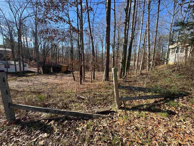 a view of a backyard of the house