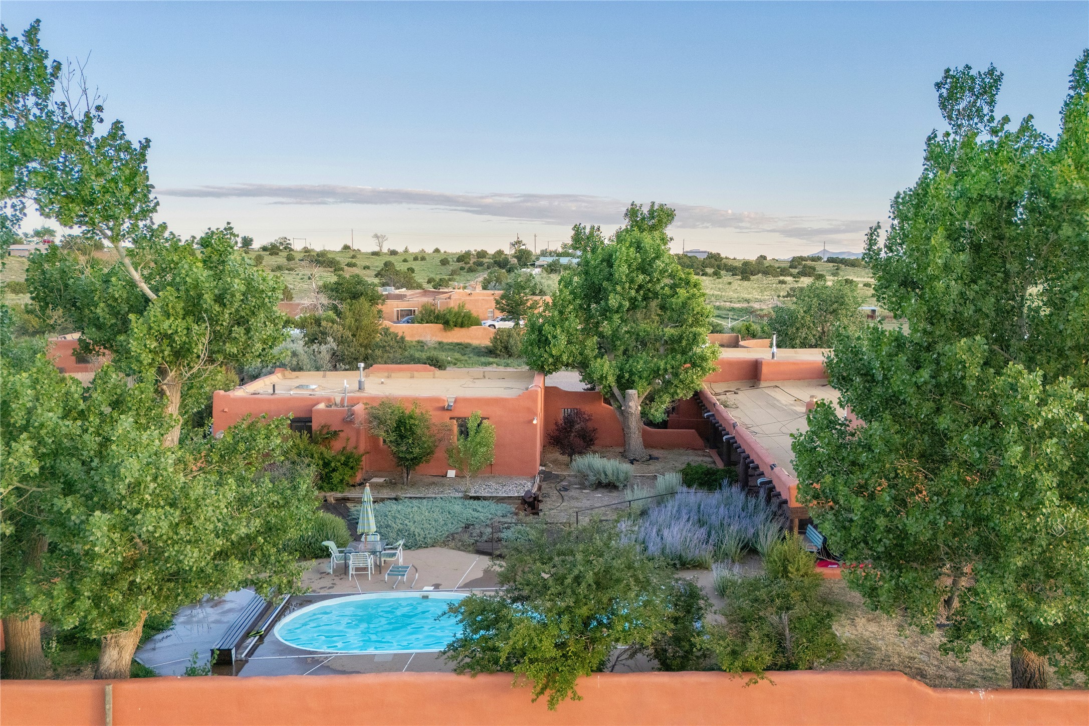 54 Rons Road Santa Fe, NM 87508 - Photo 59 of 99 Aerial looking at pool, casita and main house portal on right