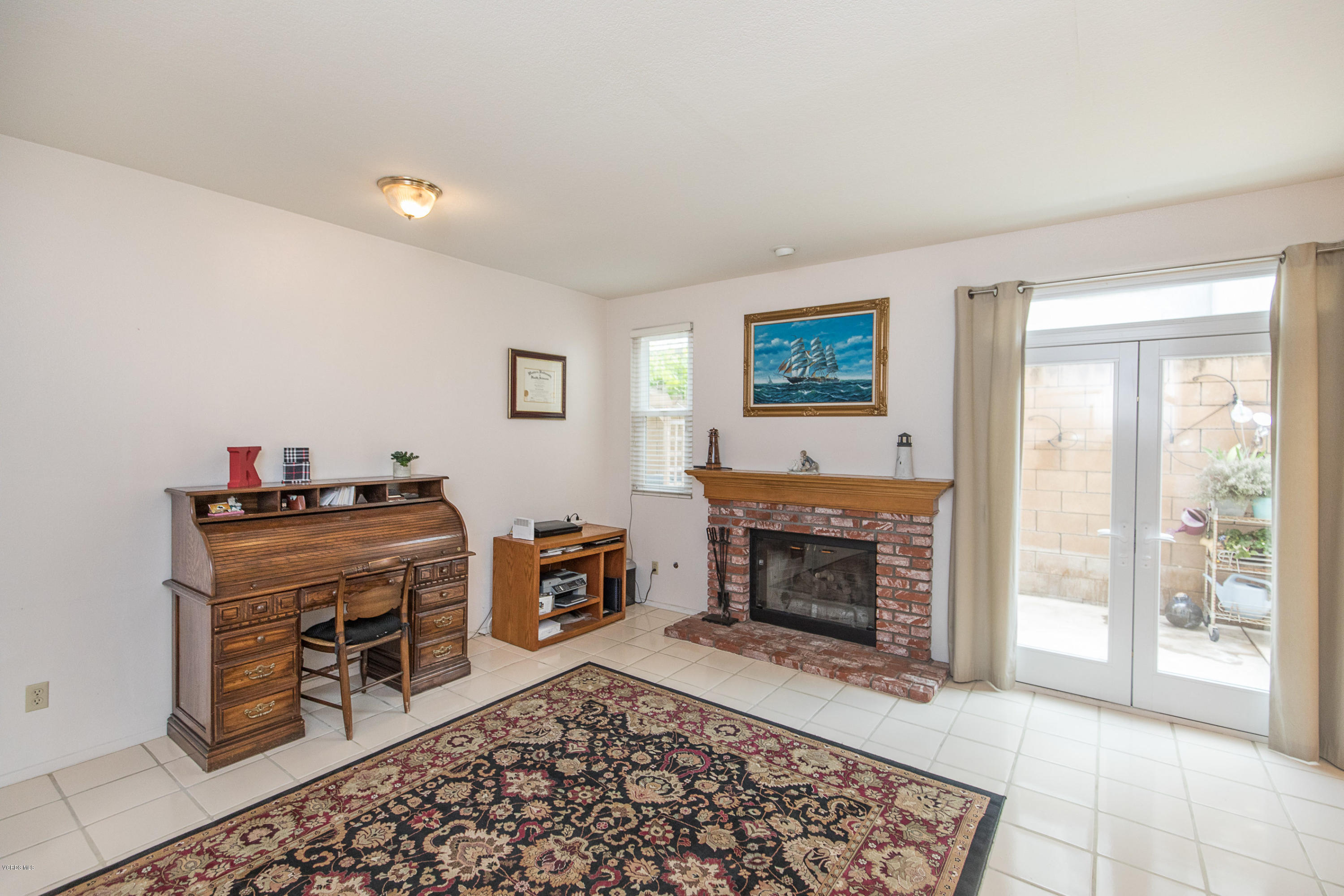 3959 Timberridge Road Moorpark, CA 93021 - Photo 13 of 48 a living room with furniture and a fireplace