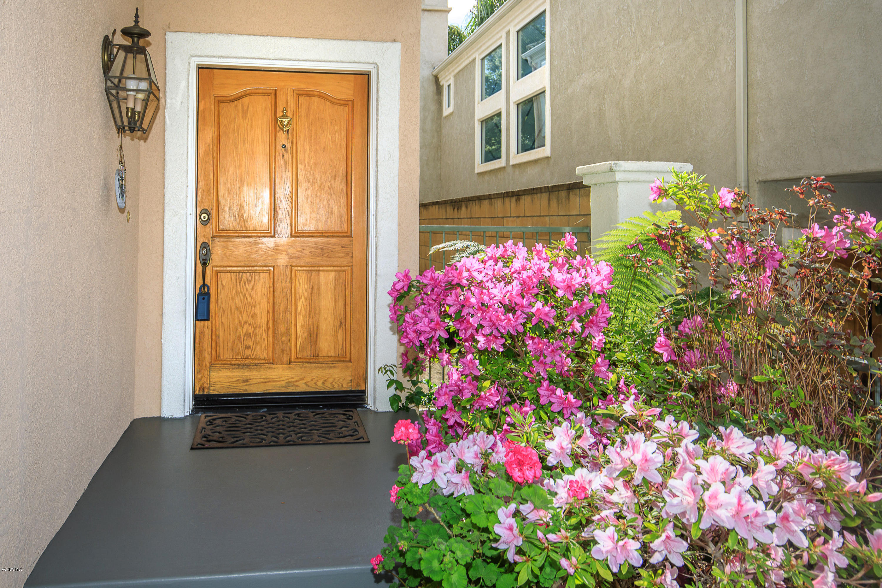 3959 Timberridge Road Moorpark, CA 93021 - Photo 3 of 48 a flowers in front of a house