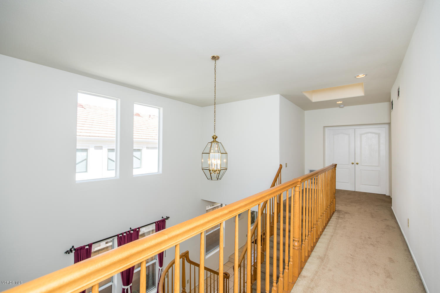 3959 Timberridge Road Moorpark, CA 93021 - Photo 21 of 48 a view of a hallway with windows