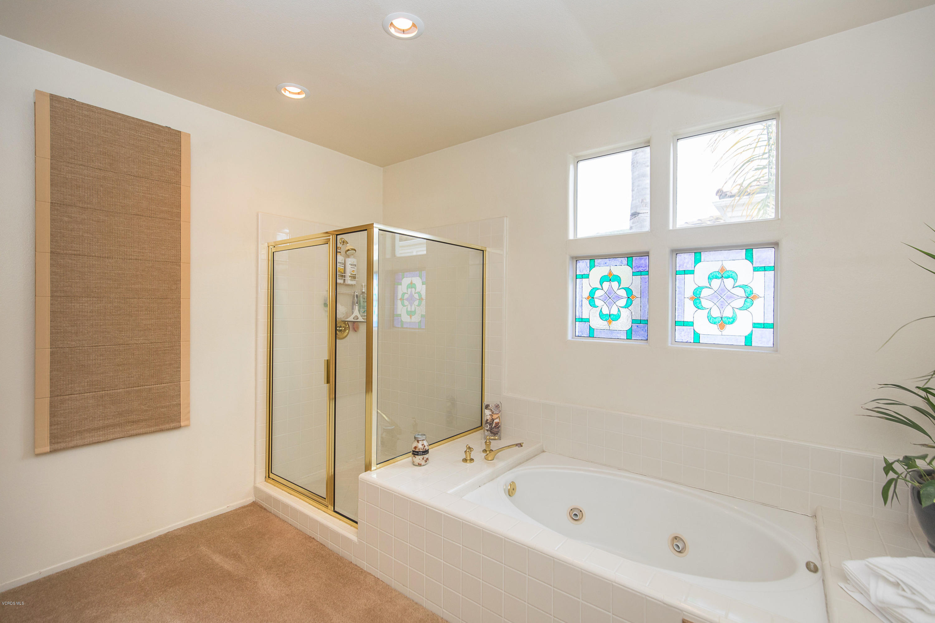 3959 Timberridge Road Moorpark, CA 93021 - Photo 26 of 48 a bathroom with a bathtub and a shower