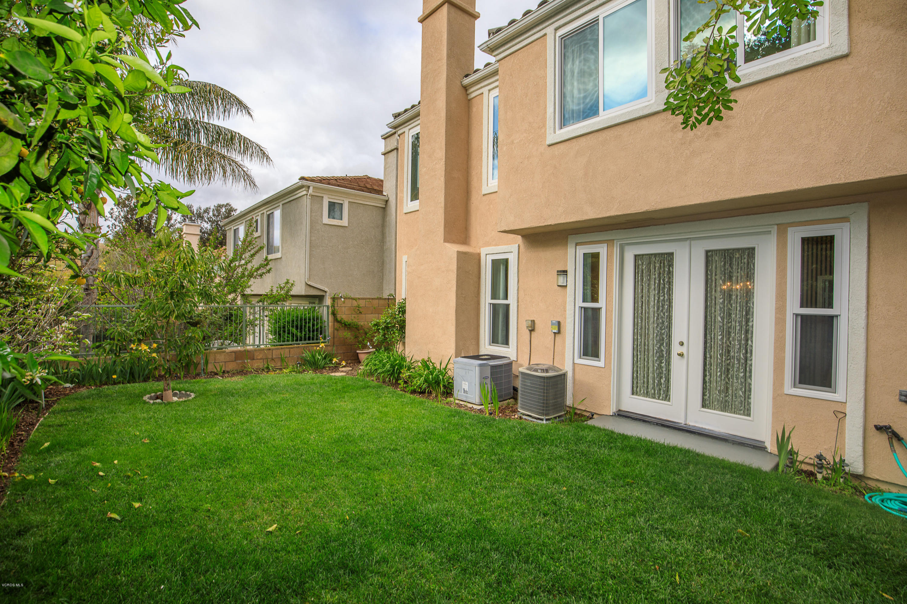 3959 Timberridge Road Moorpark, CA 93021 - Photo 36 of 48 a view of a front of a house with a yard