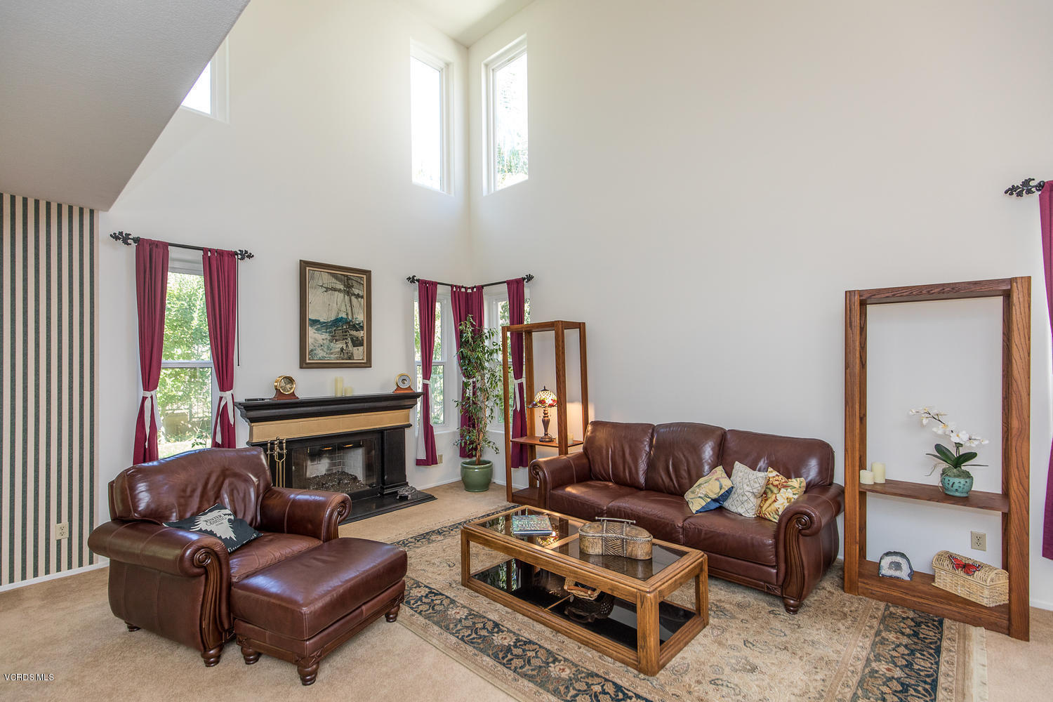 3959 Timberridge Road Moorpark, CA 93021 - Photo 7 of 48 a living room with furniture a flat screen tv and a window