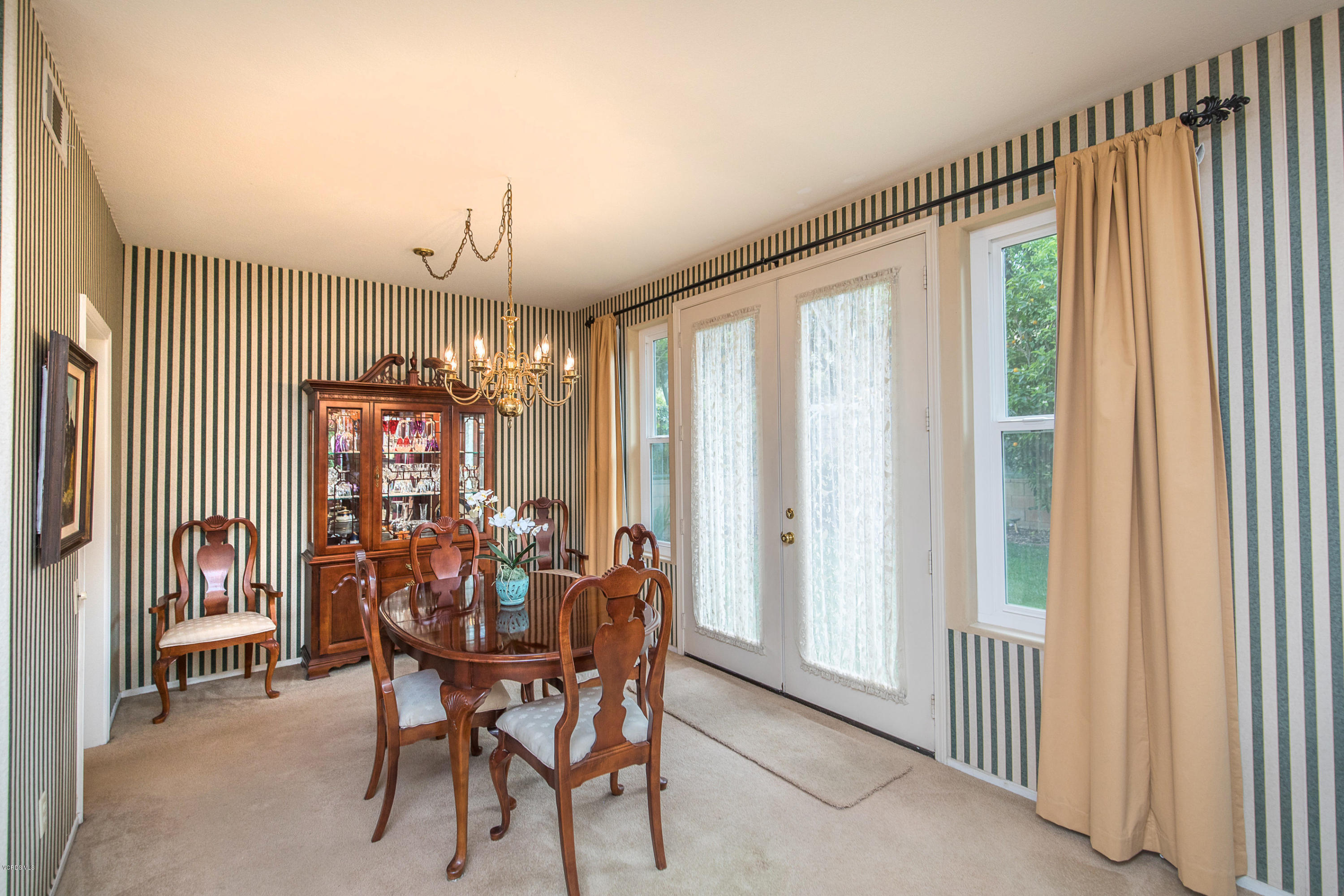 3959 Timberridge Road Moorpark, CA 93021 - Photo 9 of 48 a view of a dining room with furniture and chandelier