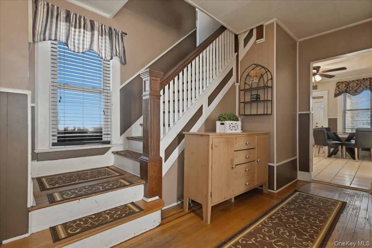 1165 Meadowbrook Road Merrick, NY 11566 - Photo 6 of 36 a view of an entryway with wooden floor