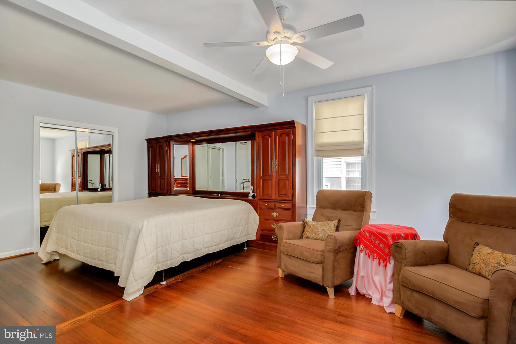 3835 Military Road Northwest Washington, DC 20015 - Photo 14 of 28 a bedroom with a bed couch and window