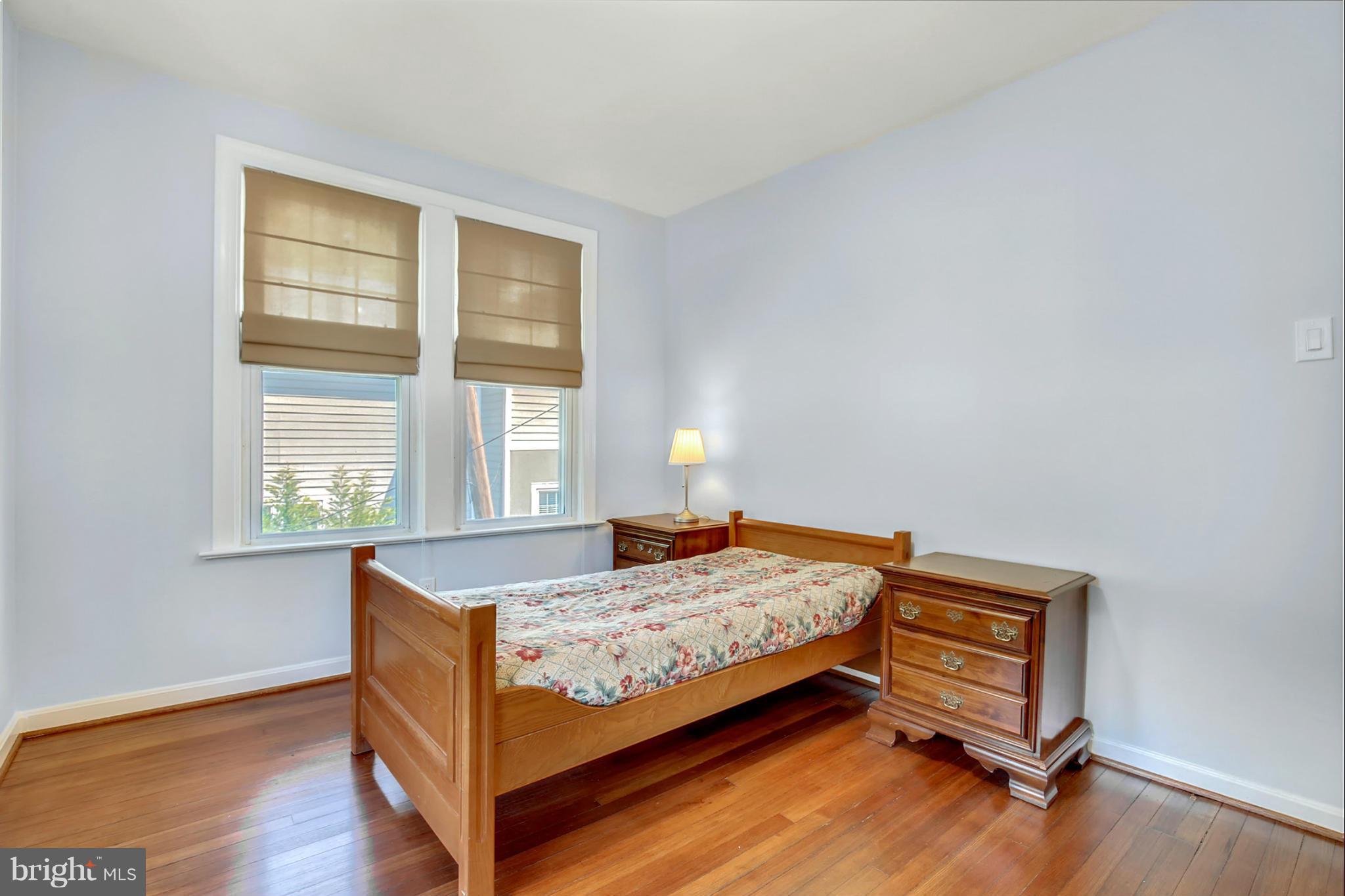3835 Military Road Northwest Washington, DC 20015 - Photo 18 of 28 a bedroom with a bed and window