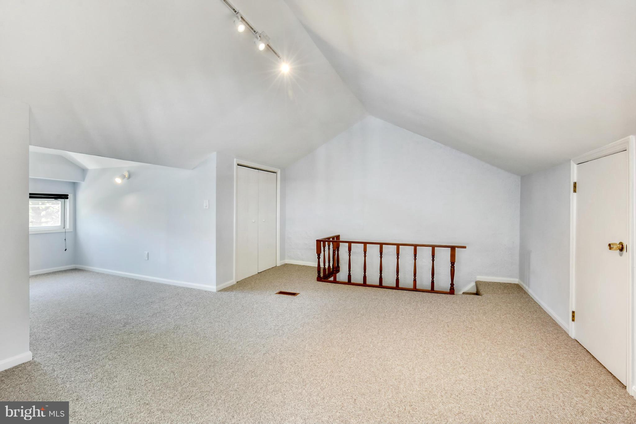 3835 Military Road Northwest Washington, DC 20015 - Photo 21 of 28 a view of an empty room with staircase