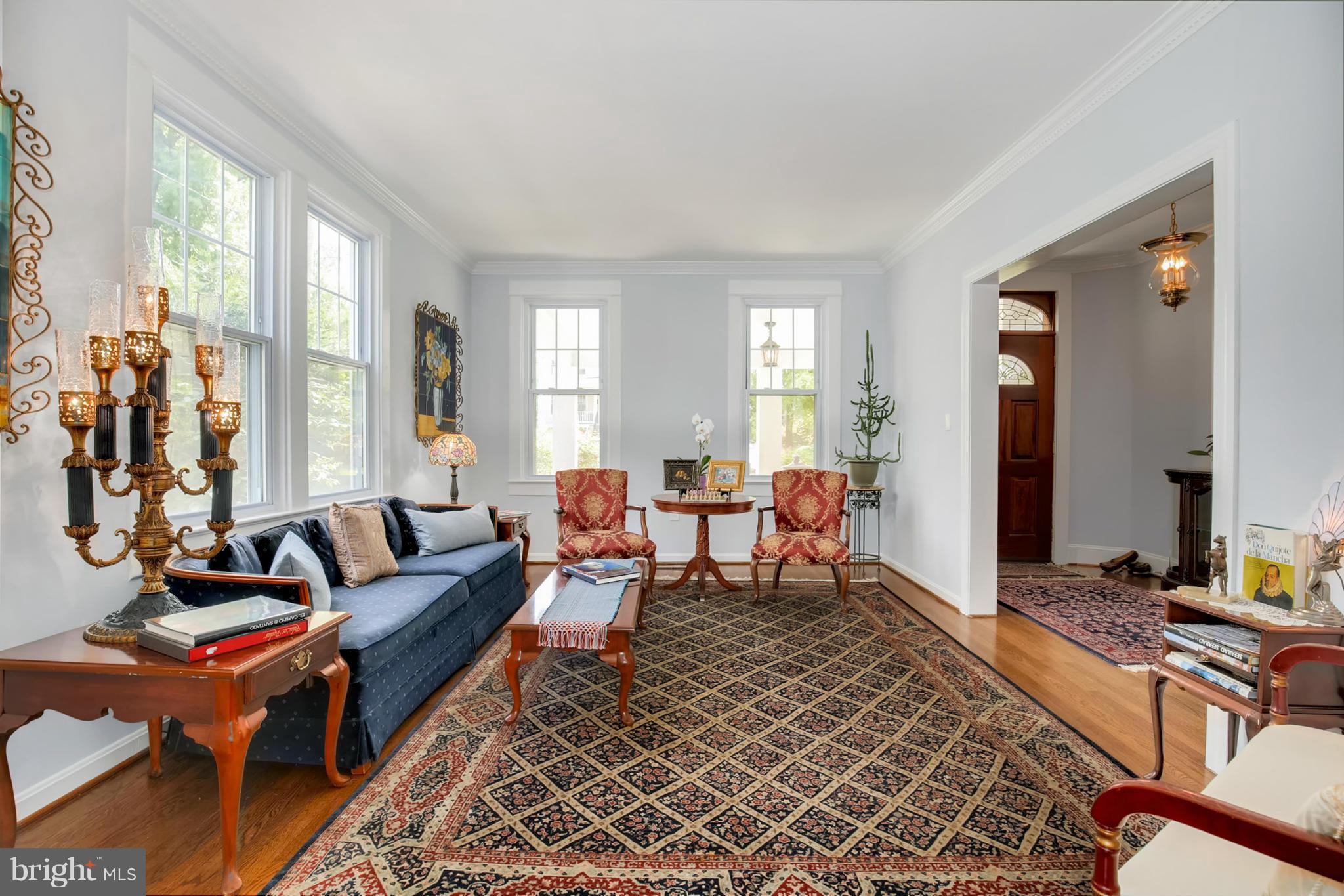 3835 Military Road Northwest Washington, DC 20015 - Photo 7 of 28 a living room with furniture a rug and a window