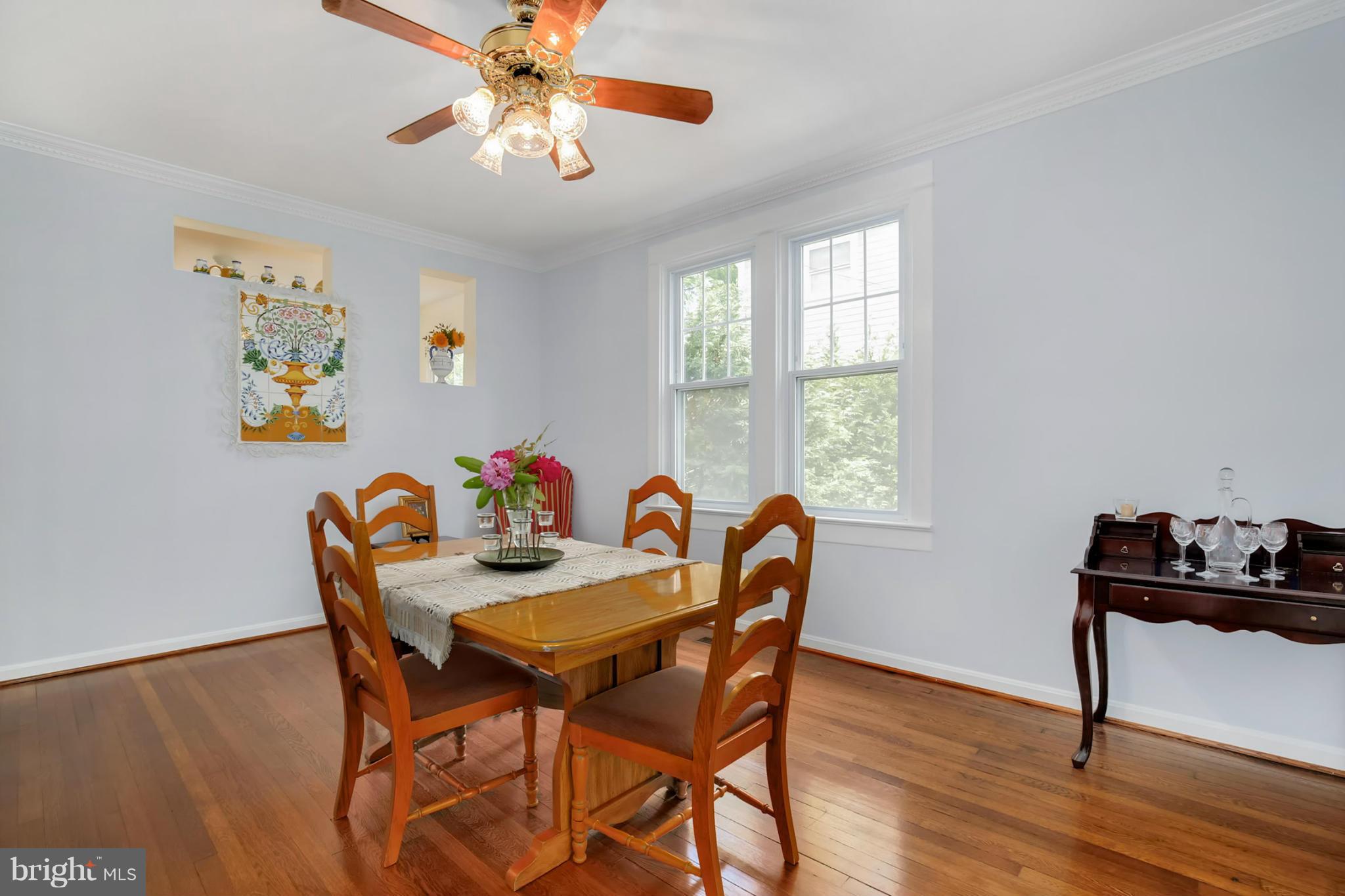 3835 Military Road Northwest Washington, DC 20015 - Photo 9 of 28 a view of a dining room with furniture window and wooden floor