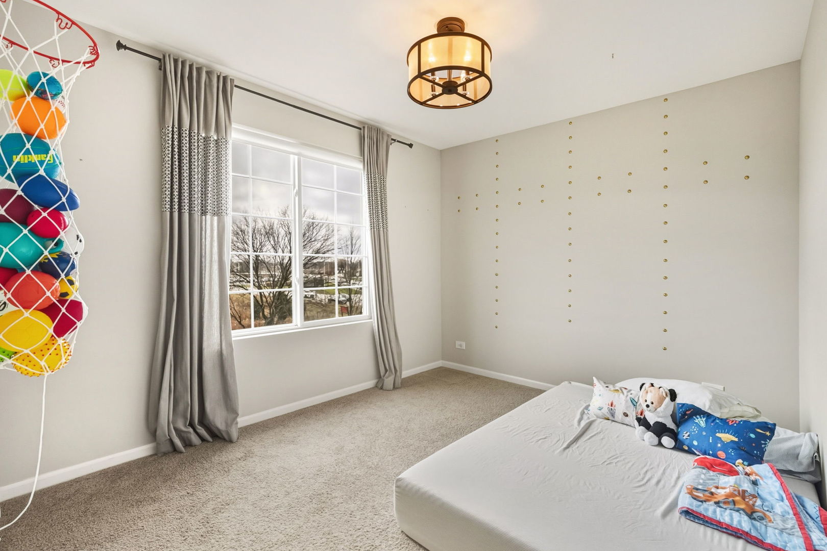 8536 Grove Street Morton Grove, IL 60053 - Photo 19 of 26 a view of a room with toys and ceiling fan