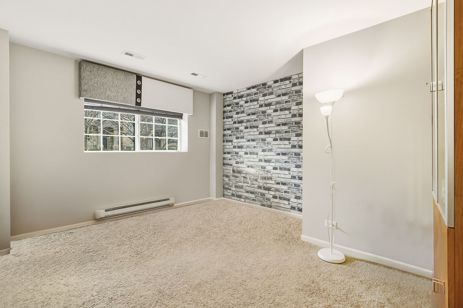 8536 Grove Street Morton Grove, IL 60053 - Photo 23 of 26 an empty room with windows