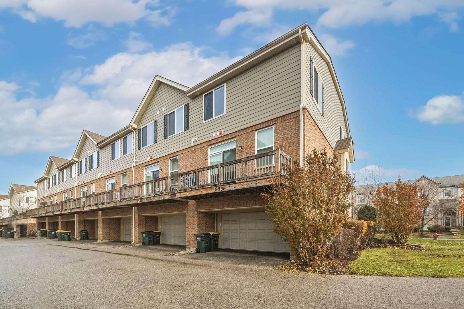 8536 Grove Street Morton Grove, IL 60053 - Photo 25 of 26 a tall building with large windows
