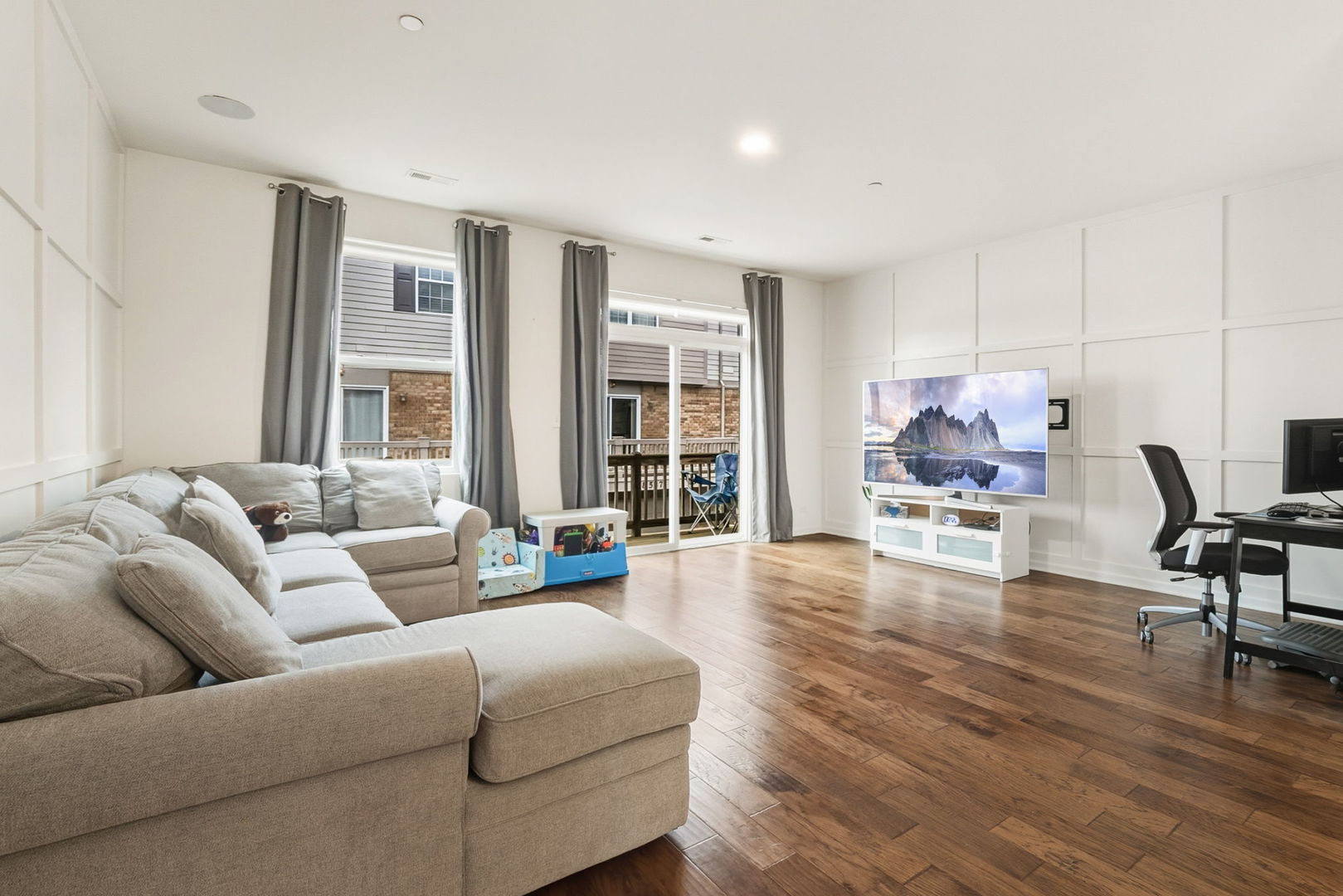 8536 Grove Street Morton Grove, IL 60053 - Photo 3 of 26 a living room with furniture and a large window