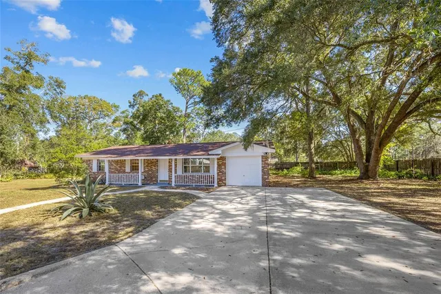 a house view with a garden space