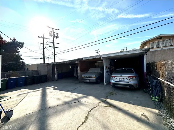 a view of a cars park in front of house