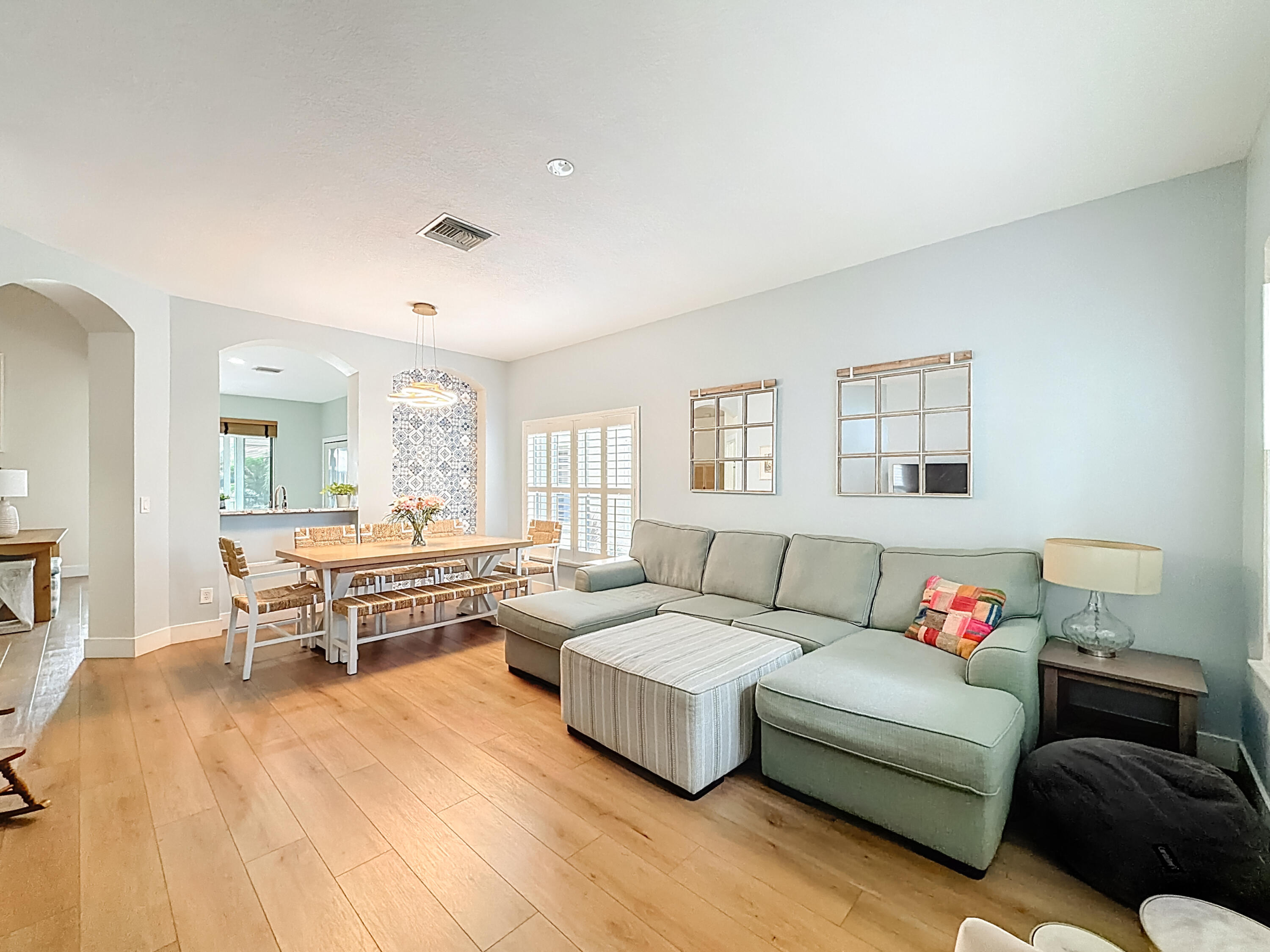 1143 Canoe Point Delray Beach, FL 33444 - Photo 11 of 85 a living room with furniture and a wooden floor